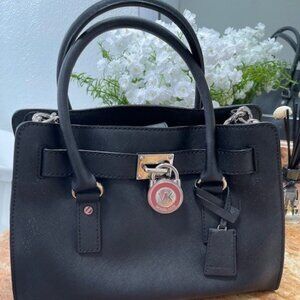 Michael Kors Small Leather Satchel in Black (8.5Hx12Wx4.5L) with strap.
